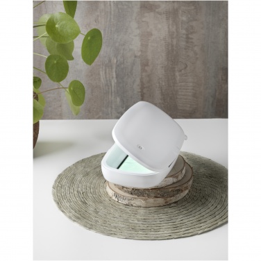 Logo trade advertising products image of: Capsule UV smartphone sanitizer with 5W wireless charging pad