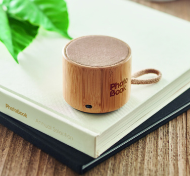 Logo trade promotional products picture of: Round bamboo wireless speaker