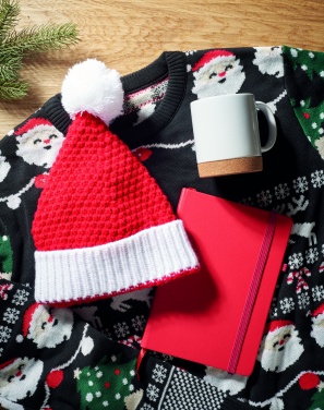 Logotrade meene foto: Jõulu sümboolikaga kootud müts